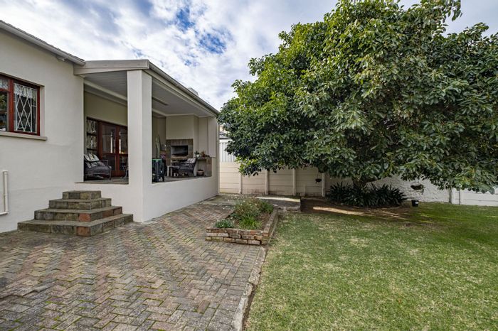 Spacious Newton Park house with open-plan living, garden, and garage for sale.