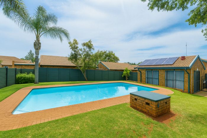 For Sale: Townhouse in Moreleta Park with garden, pool, and tennis court access.