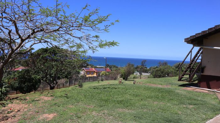 For Sale: Spacious 4-Bed House in Hibberdene Central, close to beach and amenities.