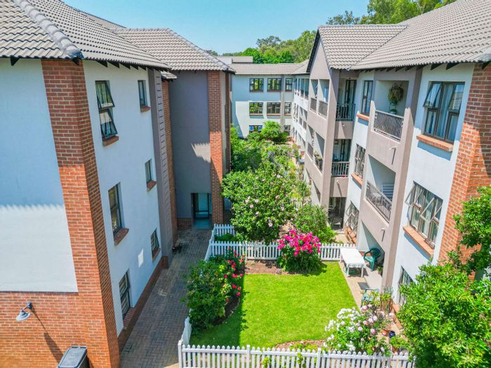 For Sale: Douglasdale Apartment with on-site amenities, gardens, and community services.
