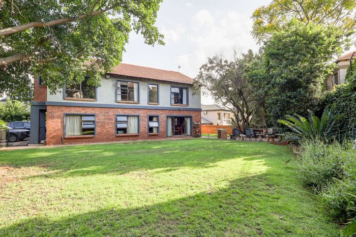 For Sale: House in Olympus AH with 4 ensuite bedrooms, garden, and double garage.