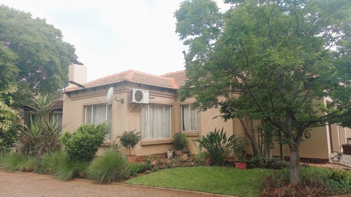 Townhouse For Sale in Brits Central: 3 beds, double garage, built-in braai.