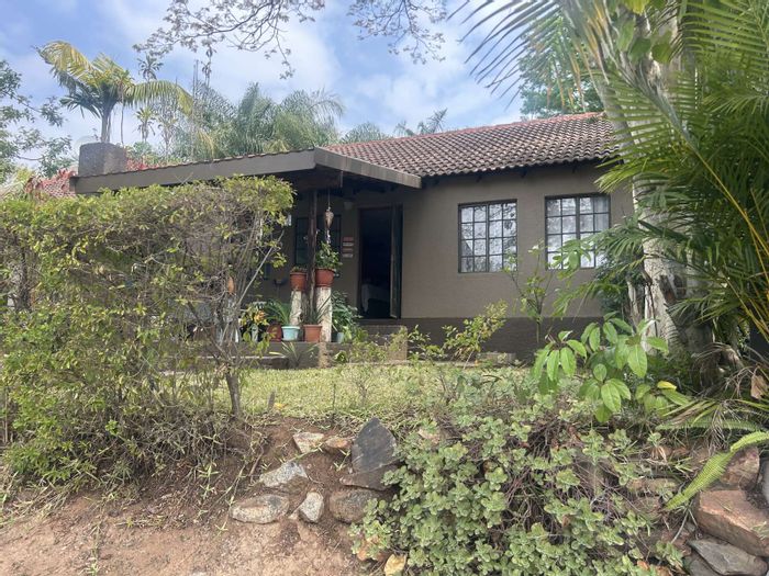 2-Bedroom Townhouse in West Acres For Sale with garden, braai, and secure access.