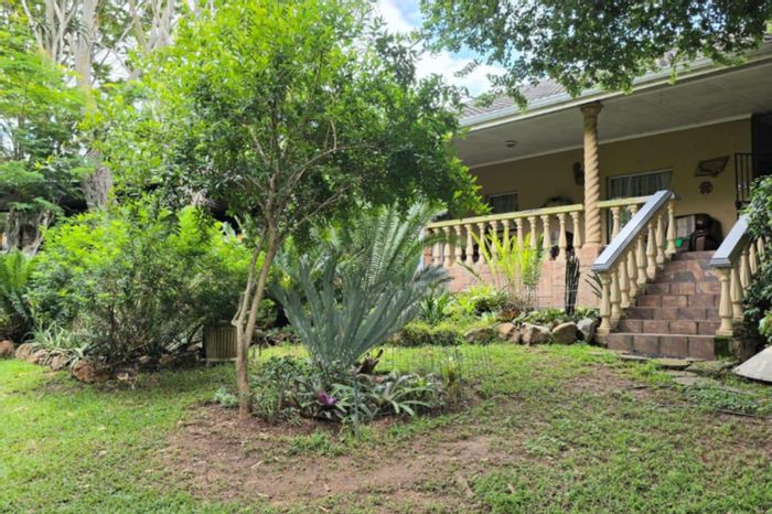 For Sale: House in West Acres Ext 1 with 4 beds, garage, and entertainment courtyard.