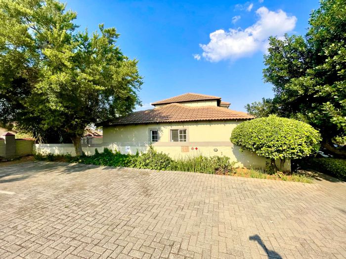 For Sale: 2-Bedroom Townhouse in Heuwelsig Estate with garden and 24-hour security.