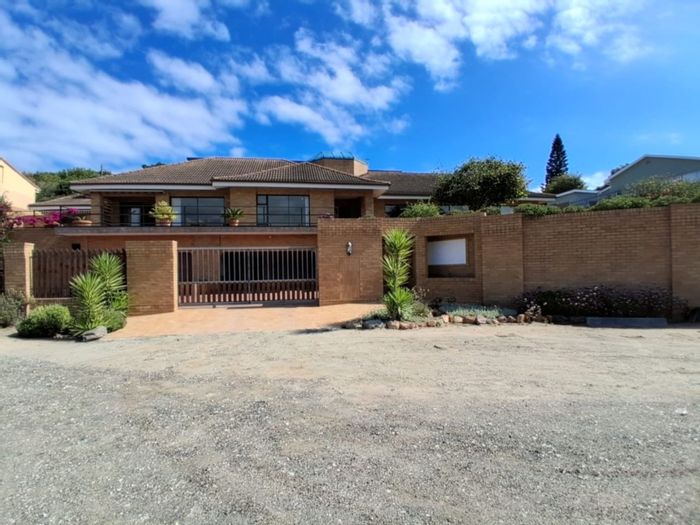 For Sale: House in Wilderness Central with lake views, pool, and four garages.