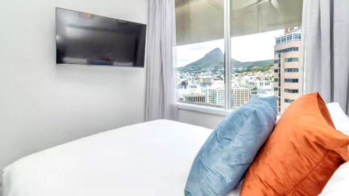 Apartment For Sale in Cape Town City Centre: Prime location, city views, Airbnb potential.