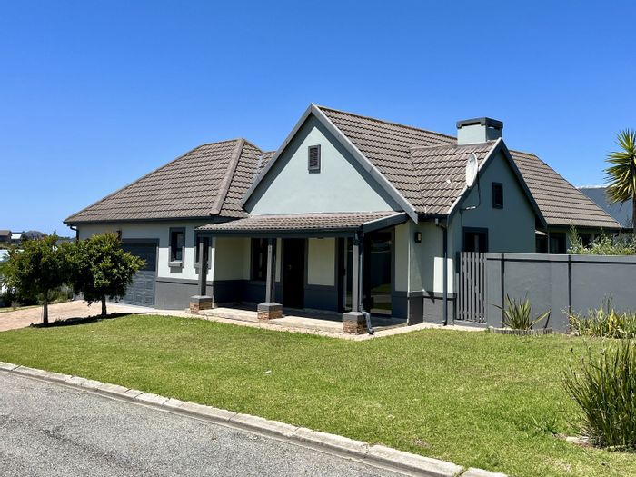 For Sale: House in Blue Mountain Village with garden, double garage, and security.