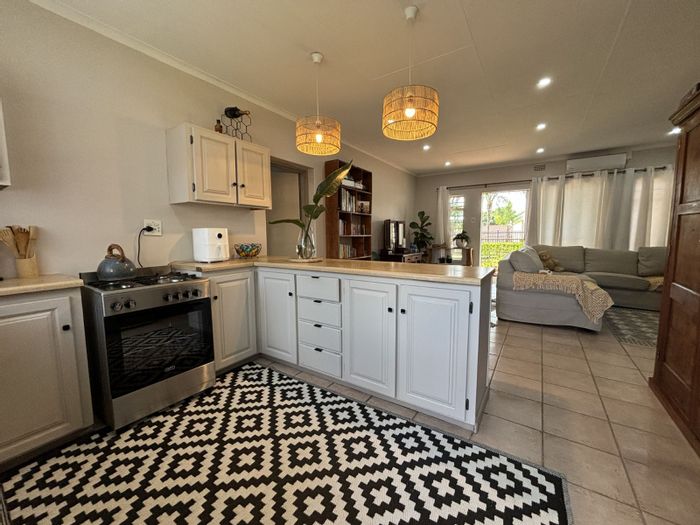 Aquapark Townhouse For Sale: 3 bedrooms, secure estate, low-maintenance garden, garage.