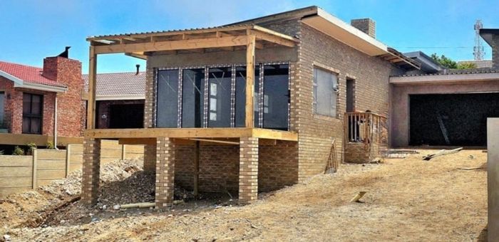 For Sale: House in Dana Bay with ocean views, 3 beds, and double garage.