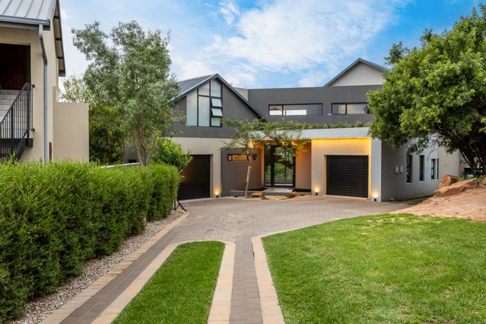Spacious 5-bedroom house with pool, gym, and flatlet in The Hills Game Reserve Estate. For Sale.