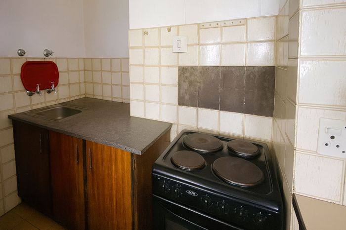 For Sale: Apartment in Pretoria West with security, parking, and convenient access.