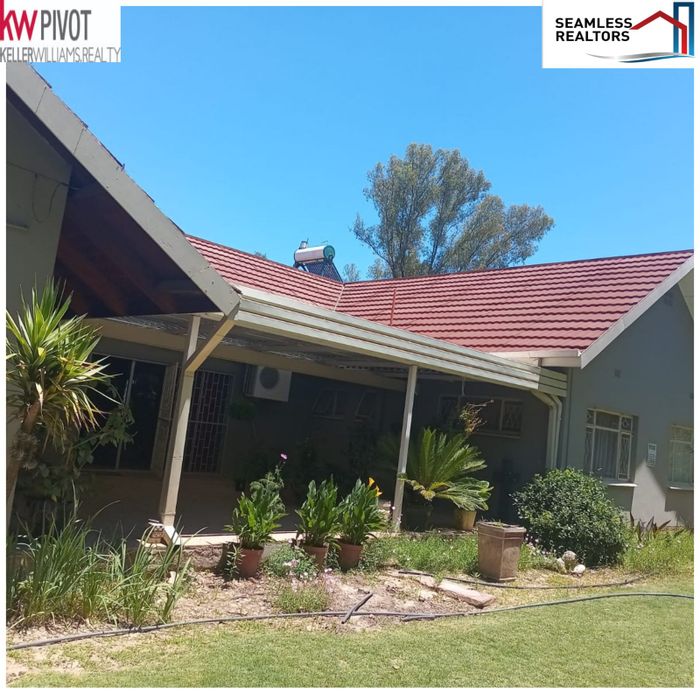 For Sale: Spacious 4-bedroom house in Christiana Central with security and entertainment features.