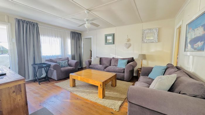 House for Sale in Hartenbos Central: 3 beds, beach access, rental potential.