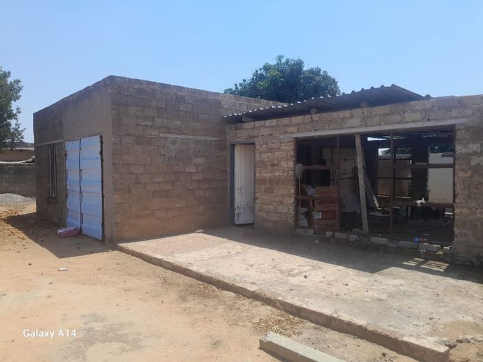 For Sale: House in Hammanskraal Central with 2 bedrooms, large stand, and extension potential.