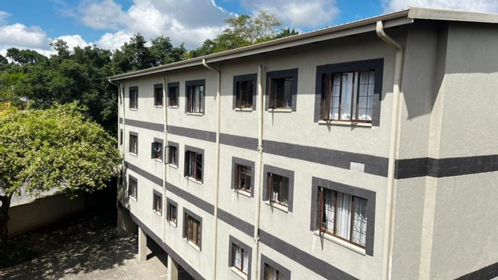 1-Bedroom Apartment For Sale in Sonheuwel with secure parking and prime location.