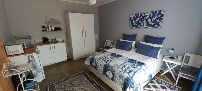 For Sale: Spacious Calitzdorp Central house with rental units, large yard, mountain views.