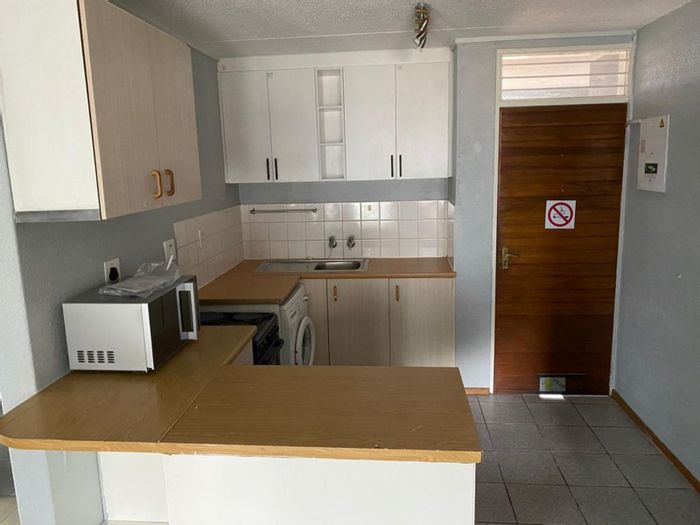 For Sale: 3-Bedroom Apartment in Westdene, ideal for students, includes pool and braai.