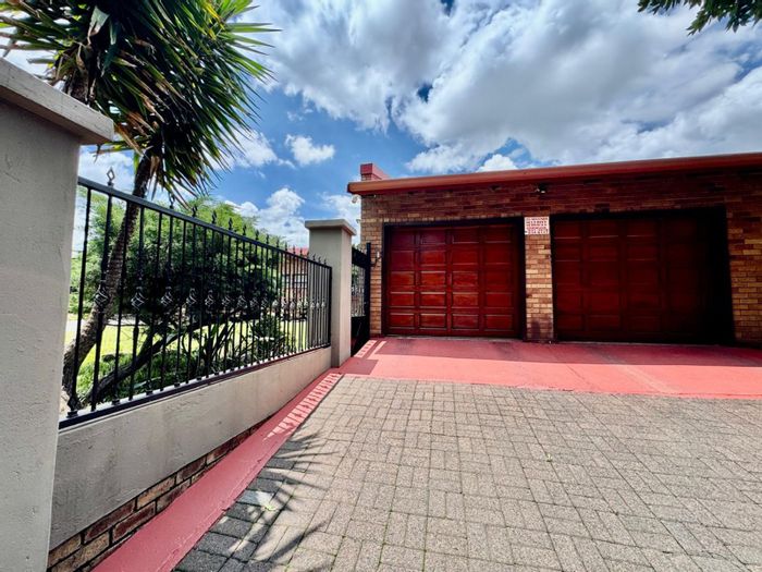 For Sale: Spacious 4-bedroom house in Secunda Central with outdoor entertainment area.