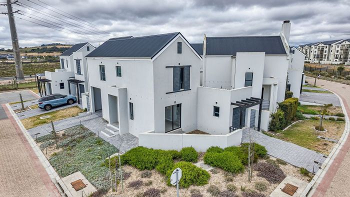 For Sale: Townhouse in Acorn Creek Lifestyle Estate with pool, security, and gardens.