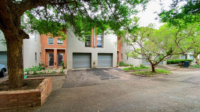 Die Wilgers Townhouse For Sale: Secure complex, private garden, close to amenities.