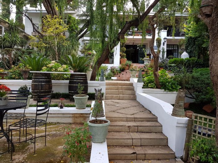 For Sale: Doornkloof Guest House with 22 rooms, event spaces, and gardens.