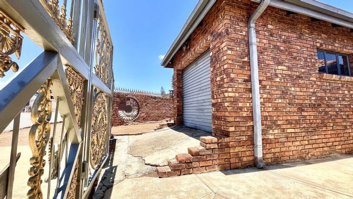 For Sale: Mabopane Central House with 2 beds, outside rooms, and rental potential.