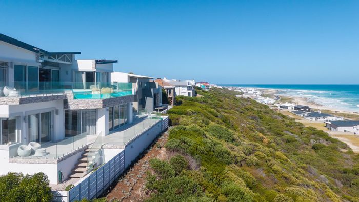 For Sale: Oceanview Heights House with infinity pool, gym, and eco-friendly features.