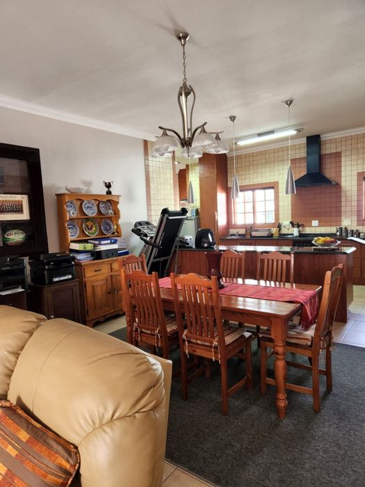 For Sale: Spacious 3-bedroom townhouse in Volksrust Central with garden and solar system.