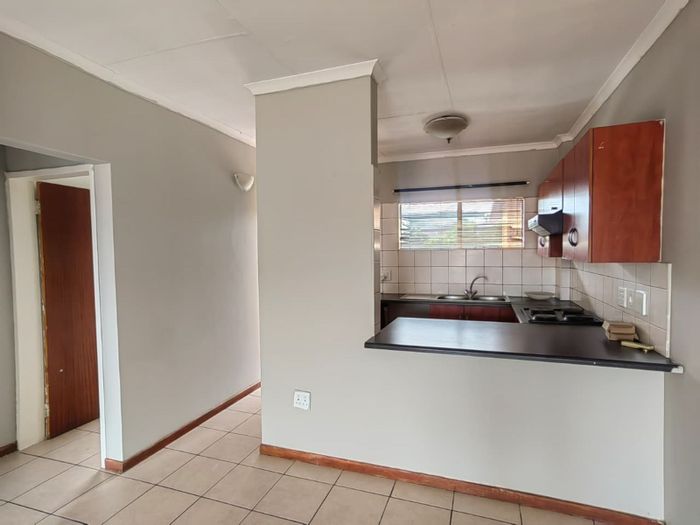 For Sale: House in Pretoria North with open kitchen, 2 bedrooms, parking options.