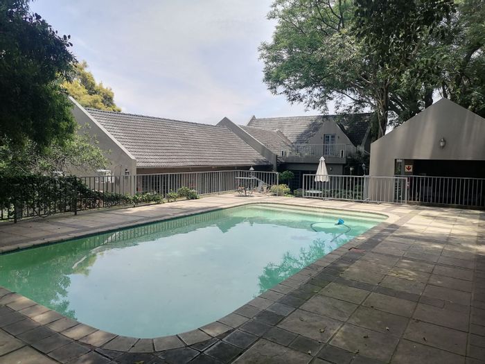 For Sale: Guest House in Waterkloof Ridge with 13 rooms, pool, and income potential.
