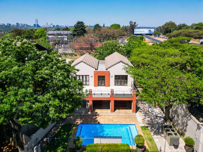 For Sale: 1-Bedroom Apartment in Bryanston with balcony and covered parking.