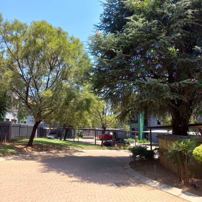 For Sale: 2-Bedroom Apartment in Honeydew Grove with secure parking and outdoor patio.