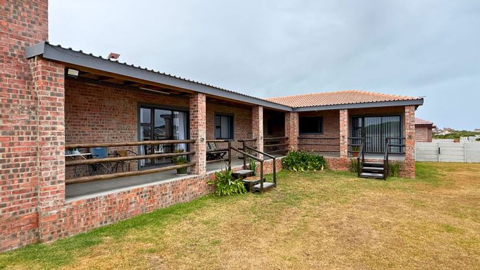 Kleinbaai House For Sale: Versatile layout, dual living potential, coastal access.