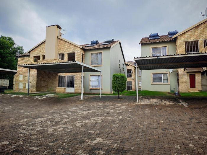 Terenure Apartment For Sale: Ground floor, private patio, built-in braai, secure parking.