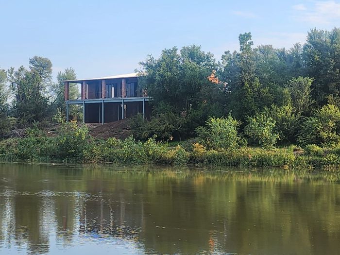 For Sale: Farm in Douglas Central with river access, game camp, and eco-friendly features.