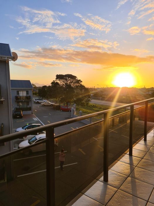 For Sale: Hartenbos Central Apartment with balcony, secure parking, and investment potential.