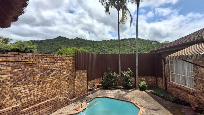 House for Sale in Nelspruit Ext 22: 3 beds, splash pool, scenic views.