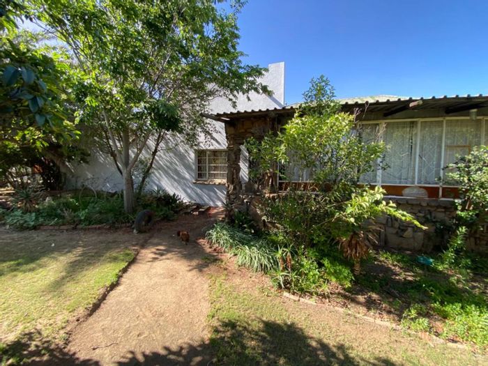 Spacious 4-bedroom house with pool, snooker room, and double garage in Winburg Central.