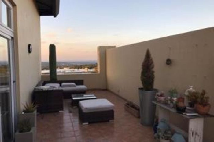 2-Bedroom Penthouse Apartment To Rent in Morningside with roof terrace and amenities.