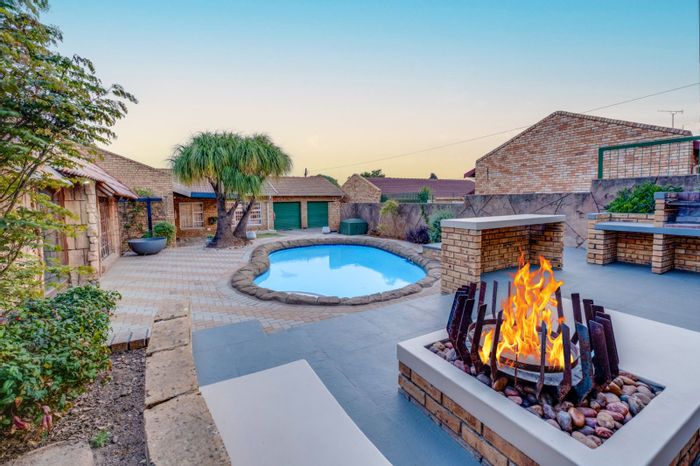 For Sale: Townhouse in Krugersdorp North with pool, entertainment area, and garages.