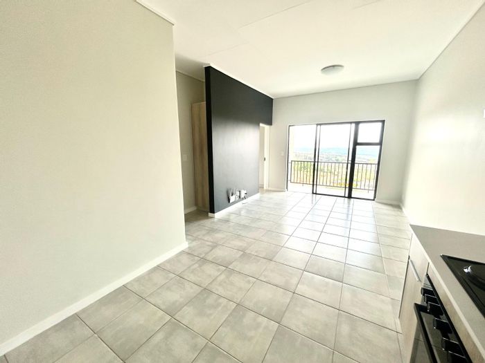 Mooikloof Apartment To Rent: 2 beds, 2 baths, secure estate, eco-friendly living.