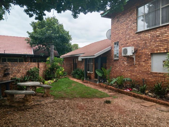 House for Sale in Brits Central: Versatile living space with business potential and pool.