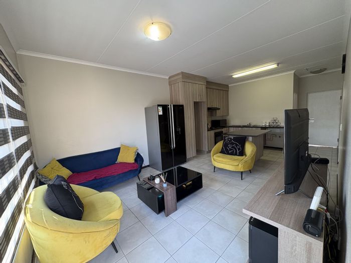 For Sale: Apartment in Ruimsig with 2 bedrooms, balcony, and secure parking.