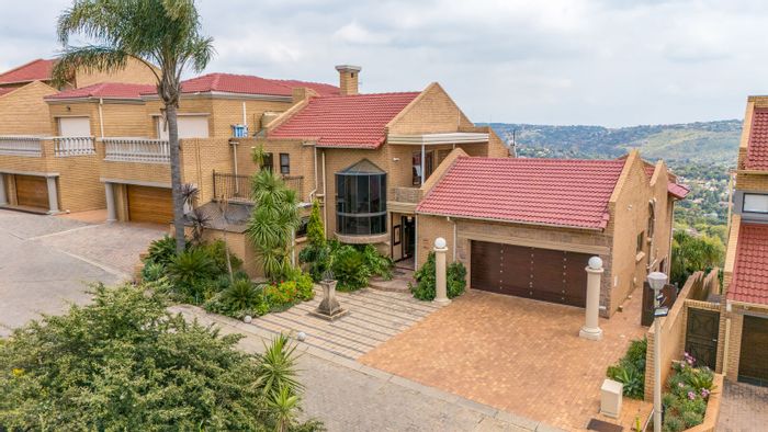 Helderkruin House For Sale: Multi-level home with entertainment space, pool, and views.