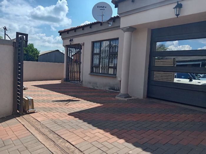 3-Bedroom House To Rent in Ga-Rankuwa with garage, carport, and paved yard.