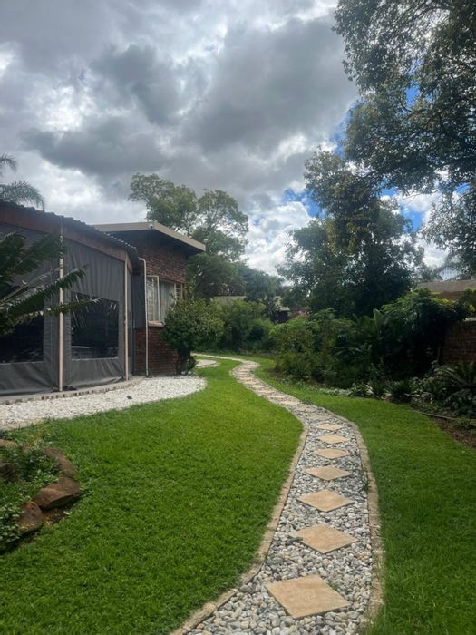 For Sale: Waterkloof Glen House with pool, garden, study, and security features.