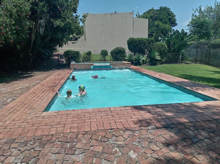 Bright 2-Bedroom Apartment with Garden, Pool, and Security in Weltevreden Park For Sale.