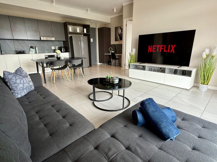 Menlyn Apartment For Sale: 2 beds, rooftop pool, secure parking, vibrant lifestyle.