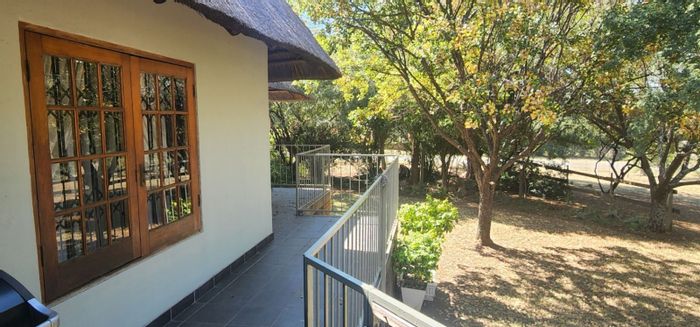 4-Bedroom House for Sale in Vaal Marina Central with Dam Views and Garden.